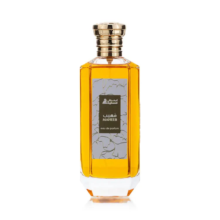 Perfume bottle with gold cap on a white background